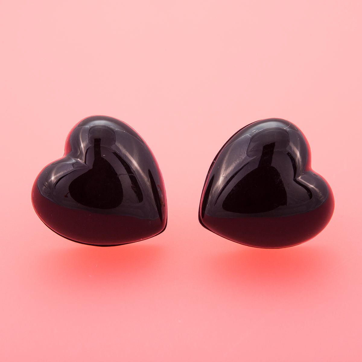 Black Heart Earrings Pink Background Dollydagger