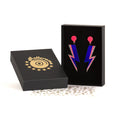 rollerama electric blue lightning bolt earrings